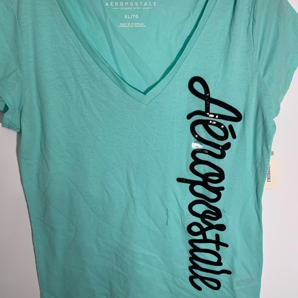 Teal green t shirt